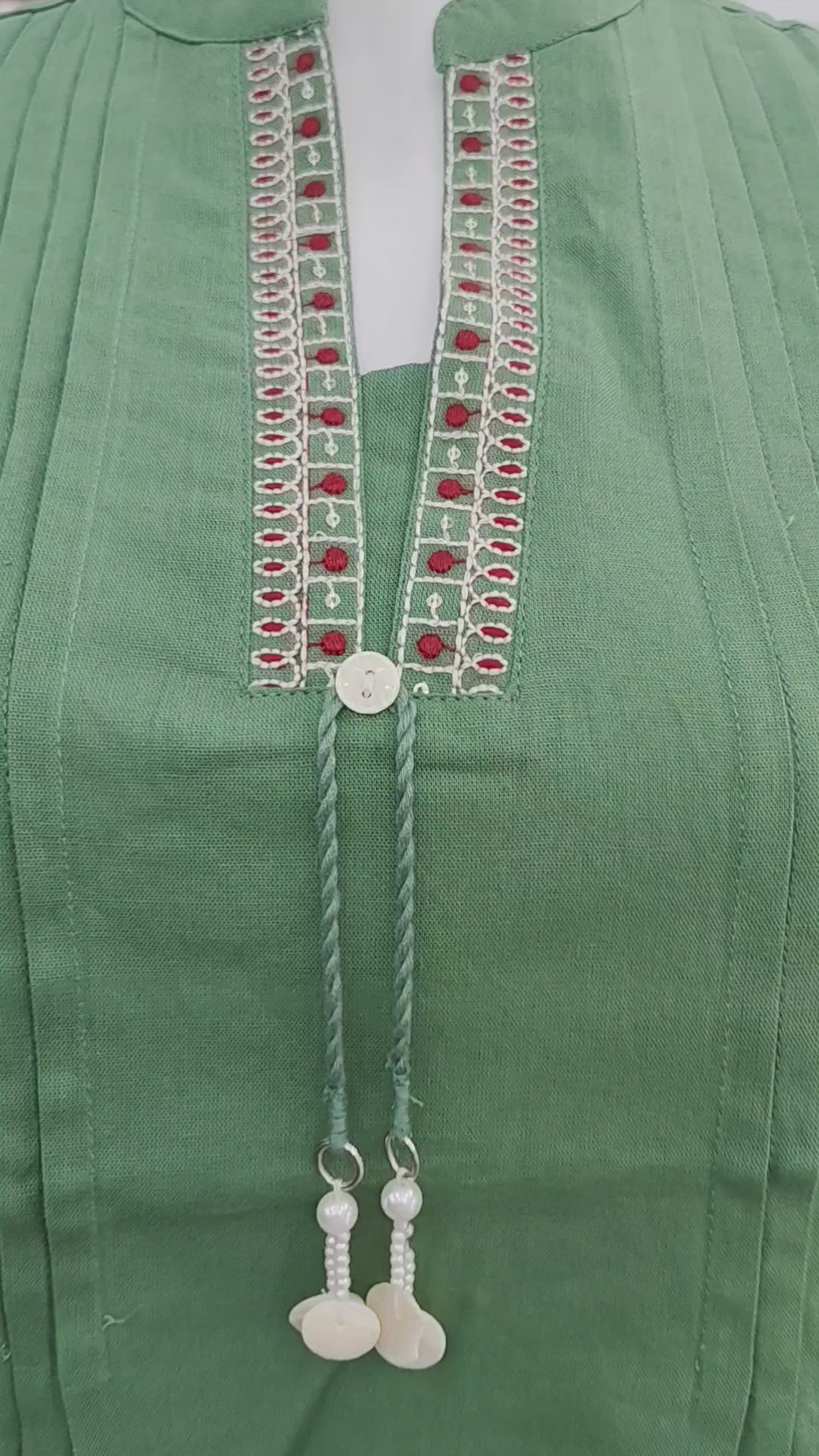 Elegant Green Cotton flex Short Top with Pintuck Design & Embroidered Neckline