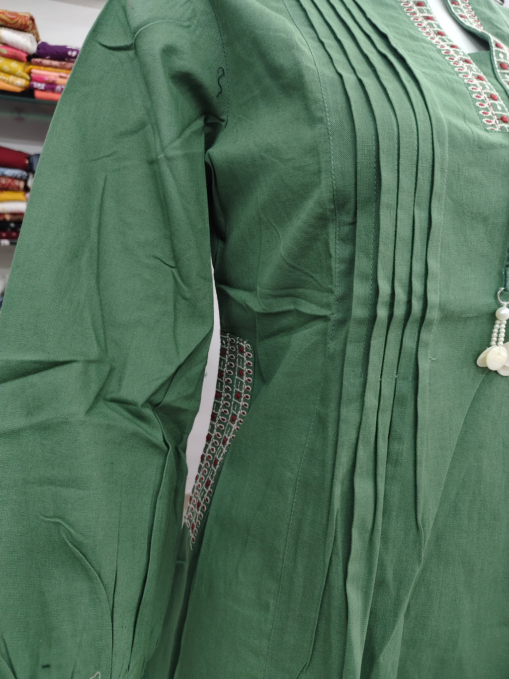 Elegant Green Cotton flex Short Top with Pintuck Design & Embroidered Neckline