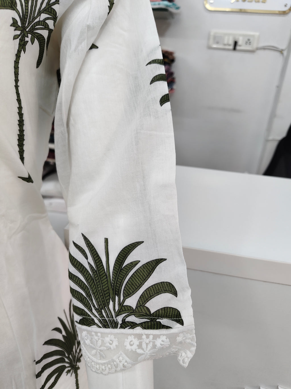 Elegant White Palm Print Kurta Set with Lace Detailing