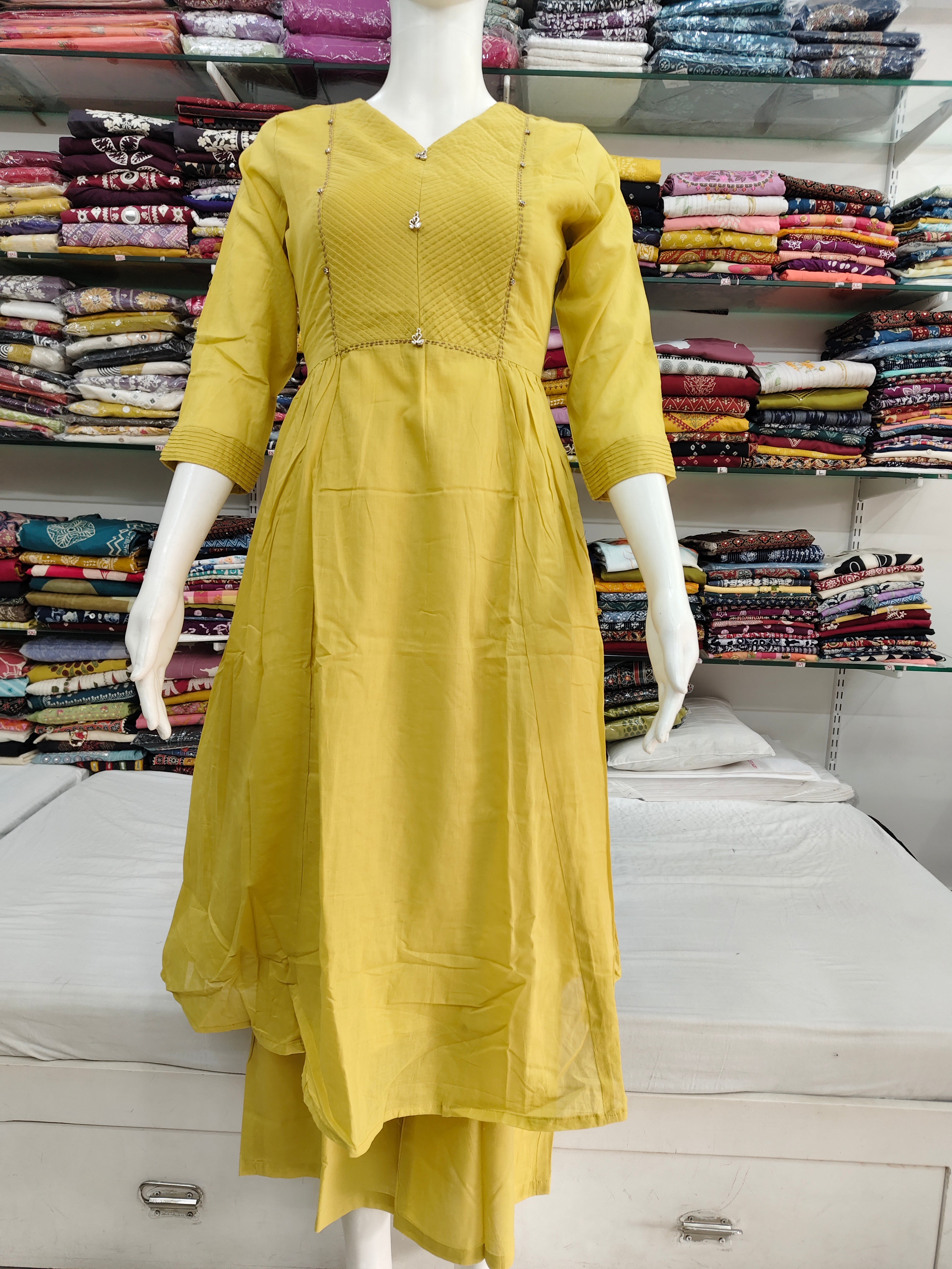 Elegant Mustard Mul Cotton 2-Piece Kurti Palazzo Set with Pintuck Detailing