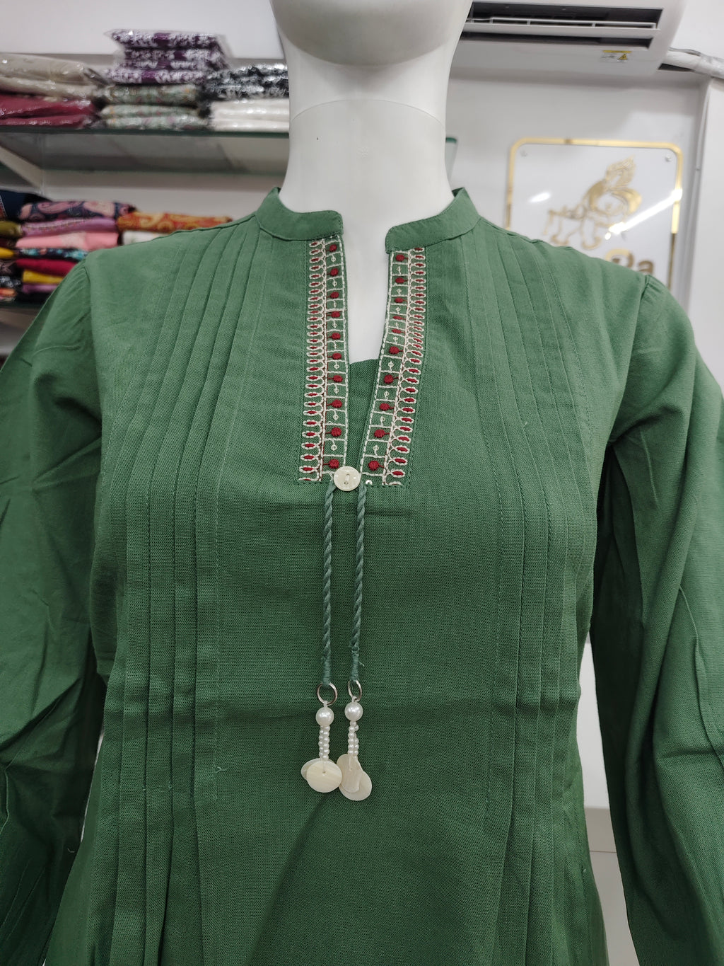 Elegant Green Cotton flex Short Top with Pintuck Design & Embroidered Neckline