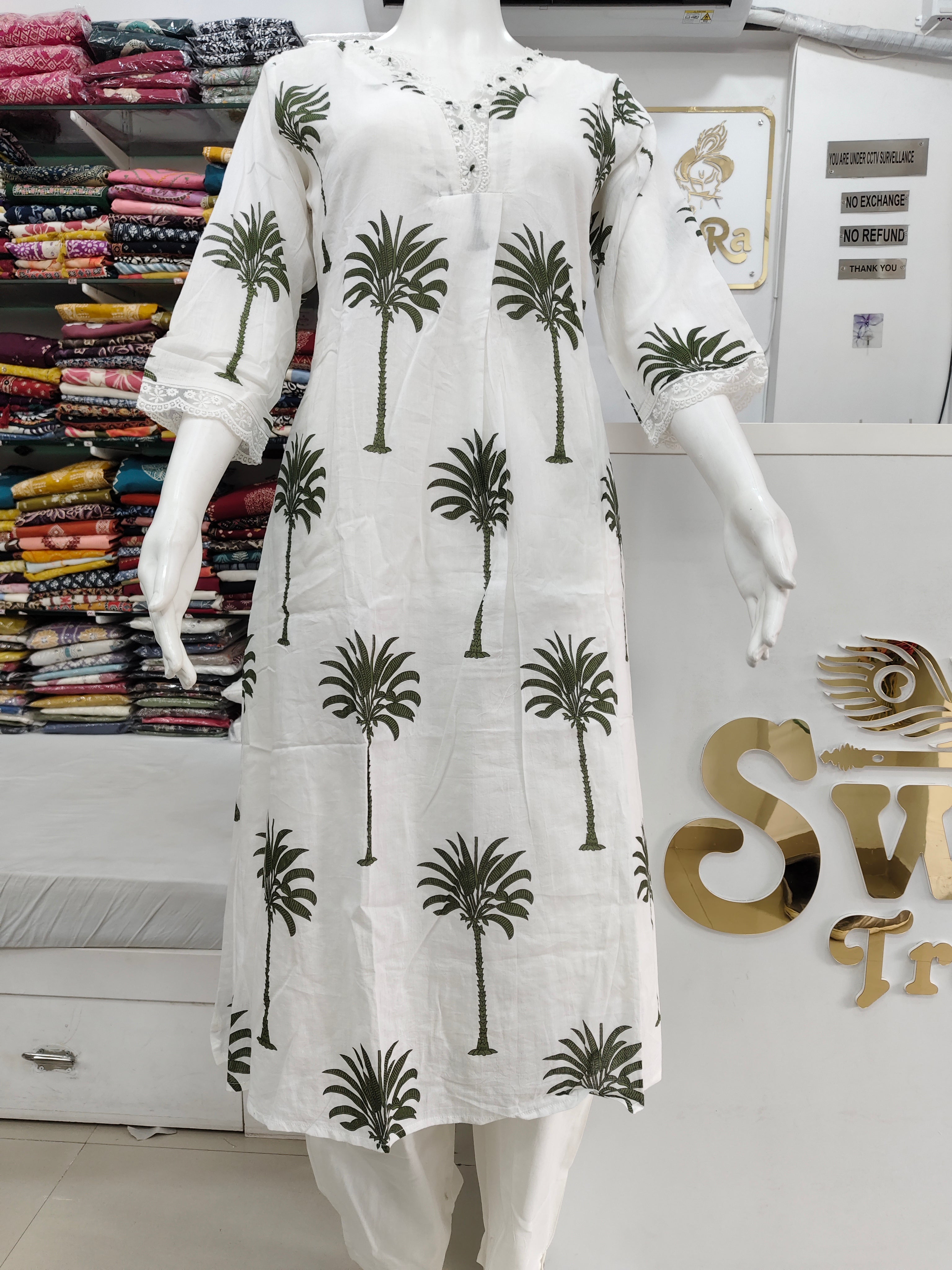 Elegant White Palm Print Kurta Set with Lace Detailing