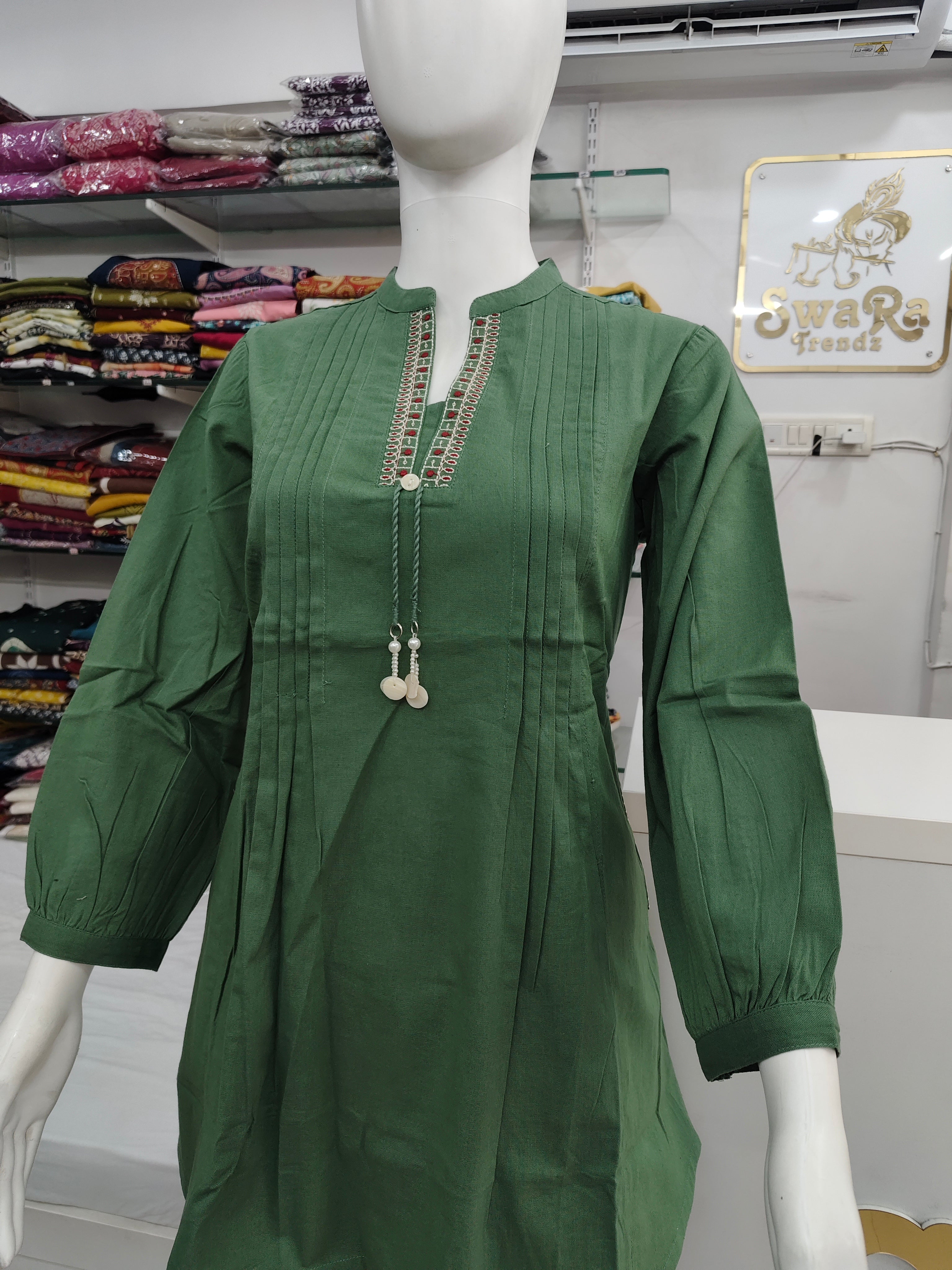 Elegant Green Cotton flex Short Top with Pintuck Design & Embroidered Neckline